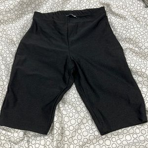 FashionNova black metallic biker shorts